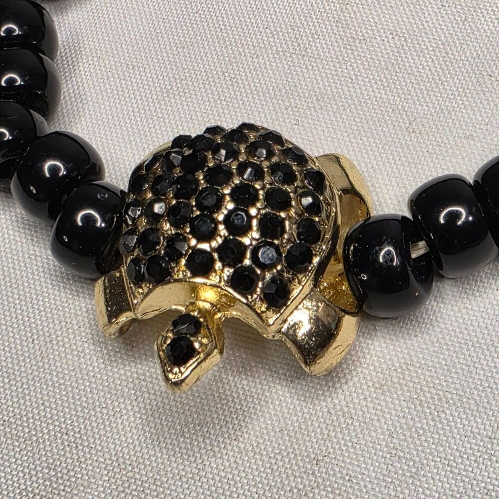 Turtle Charm Black Gem Accents Black Bead Stretch Bracelet Gold‑Tone